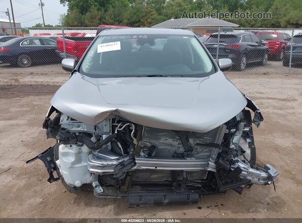 2FMPK4J98RBA77574 2024 FORD EDGE Gray Widok wnętrza z tyłu