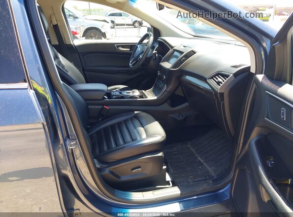 2FMPK4J99KBC34146 2019 FORD EDGE Blue Vista interior delantera