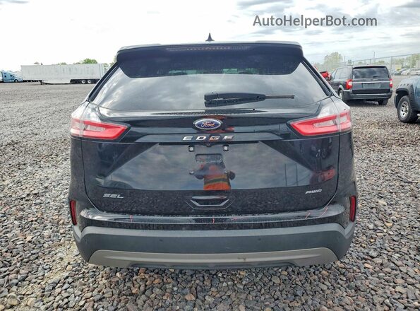 2FMPK4J99NBA77769 2022 FORD EDGE Black Widok z tyłu