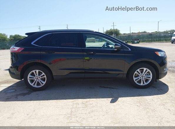 2FMPK4J9XLBA08781 2020 FORD EDGE Black Вид задньої частини салону