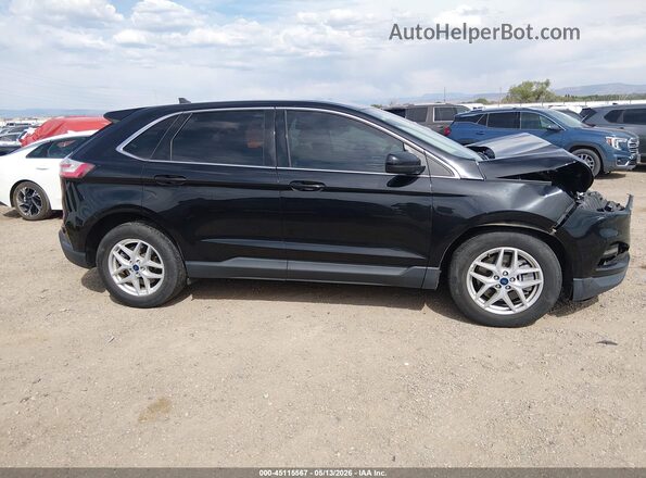 2FMPK4J9XNBA44523 2022 FORD EDGE Black Widok wnętrza z tyłu