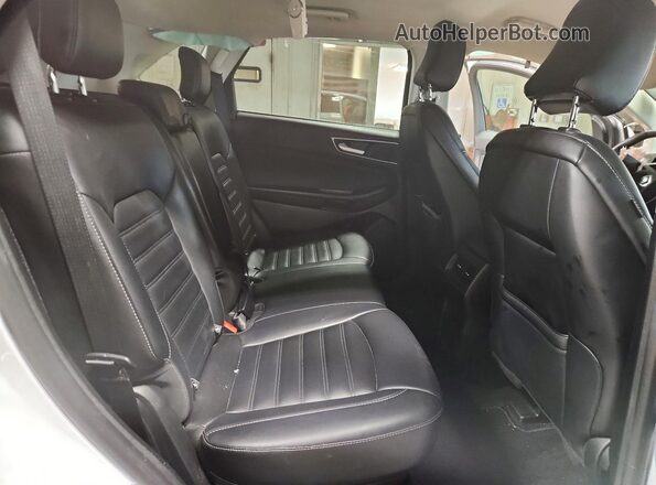 2FMPK4J9XRBA82324 2024 FORD EDGE White Widok wnętrza z tyłu