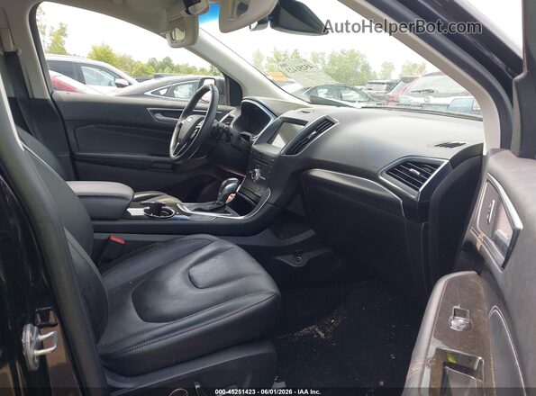 2FMPK4K83JBB36461 2018 FORD EDGE Черный Вид салона спереди