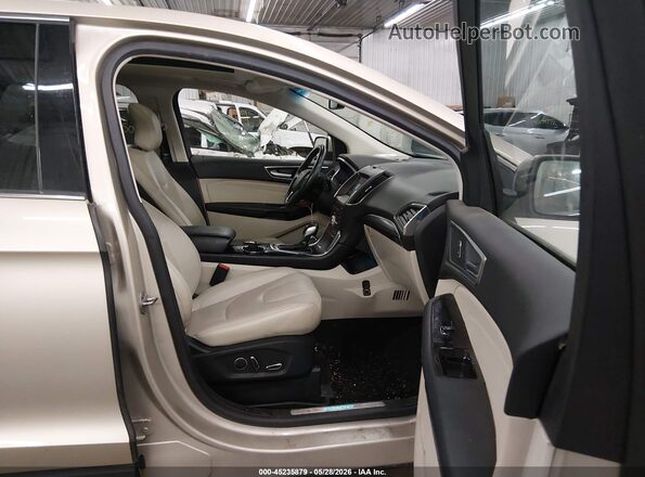 2FMPK4K90HBC62571 2017 FORD EDGE Gold Вид салону спереду