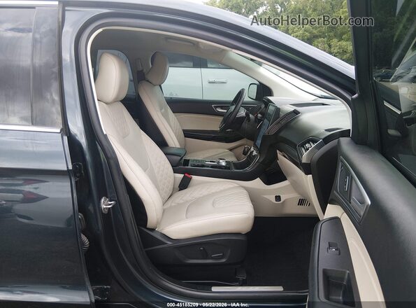 2FMPK4K90RBA18159 2024 FORD EDGE Dark Blue Vista interior delantera