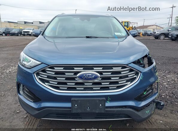 2FMPK4K91KBB39806 2019 FORD EDGE Blue Widok wnętrza z tyłu