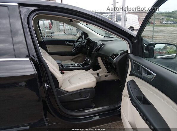 2FMPK4K95RBA48791 2024 FORD EDGE Black Vista interior delantera