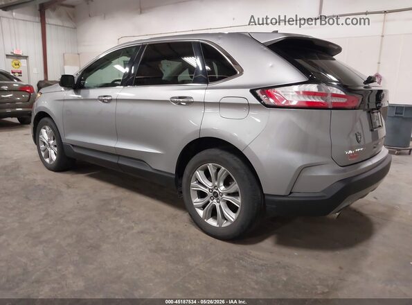 2FMPK4K98PBA57899 2023 FORD EDGE Silver Trasero izquierdo