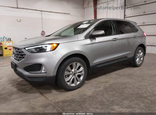 2FMPK4K98PBA57899 2023 FORD EDGE Silver Vista tres cuartos delantera izquierda