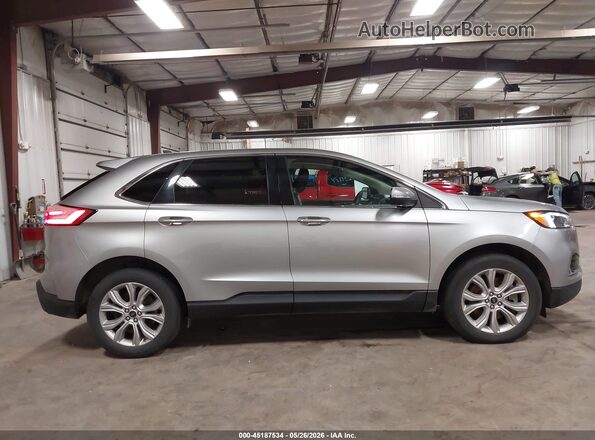 2FMPK4K98PBA57899 2023 FORD EDGE Silver Vista interior trasera