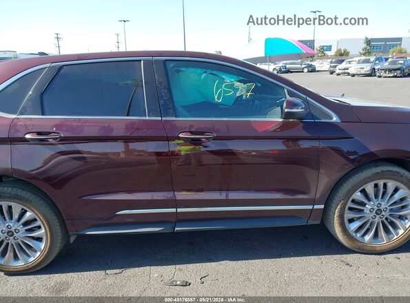 2FMPK4K98RBB23774 2024 FORD EDGE Maroon Rear interior view