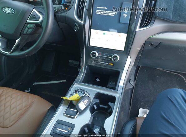 2FMPK4K98RBB23774 2024 FORD EDGE Maroon Dashboard view