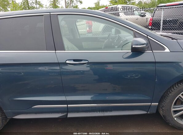2FMPK4K9XKBB60248 2019 FORD EDGE Blue Вид задньої частини салону