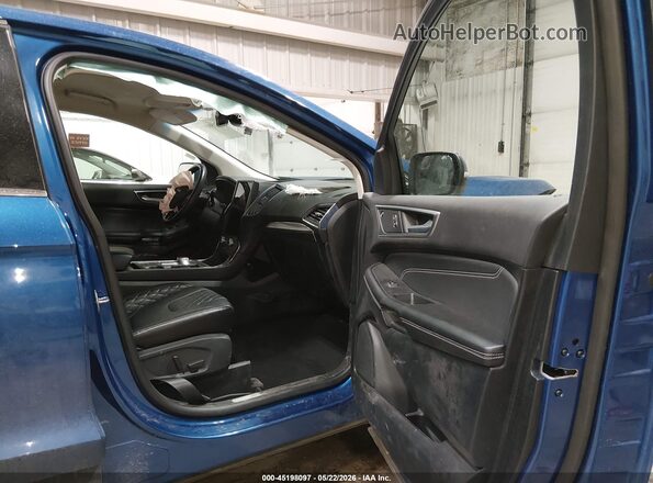2FMPK4K9XRBA80488 2024 FORD EDGE Blue Вид салону спереду
