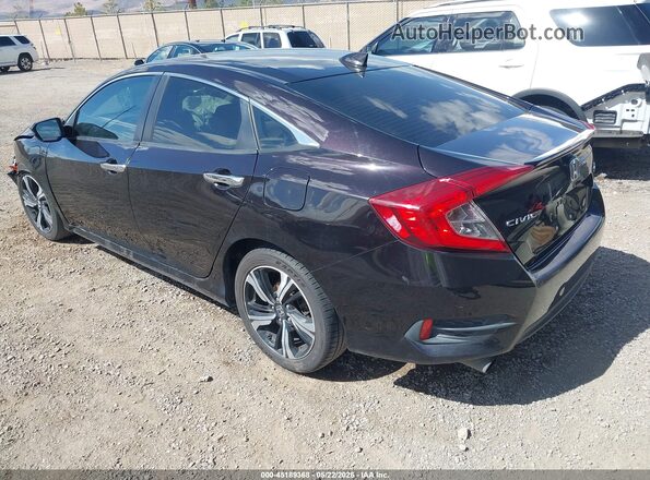 2HGFC1F97GH631638 2016 HONDA CIVIC Black Rear left