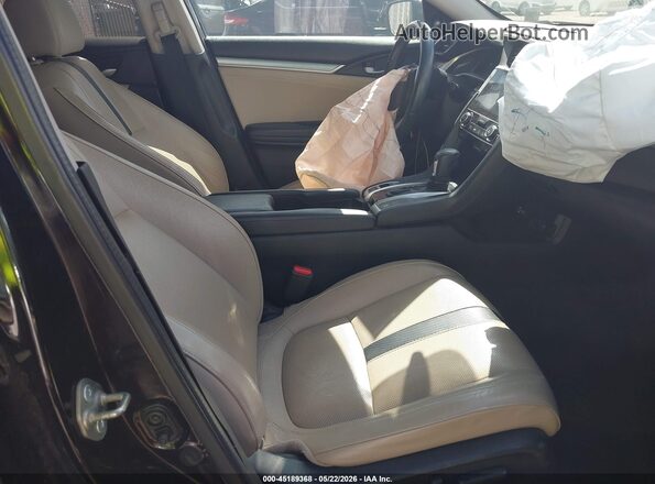 2HGFC1F97GH631638 2016 HONDA CIVIC Black Front interior view