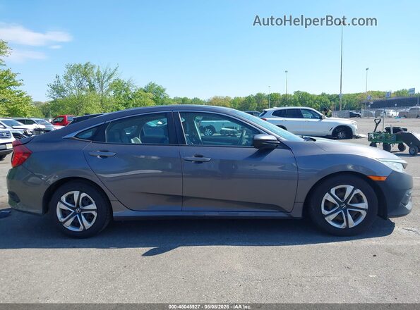 2HGFC2F54GH557338 2016 HONDA CIVIC Gray Widok wnętrza z tyłu
