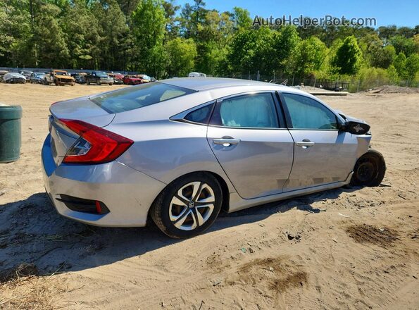 2HGFC2F55JH524632 2018 HONDA CIVIC Silver Trasero derecho