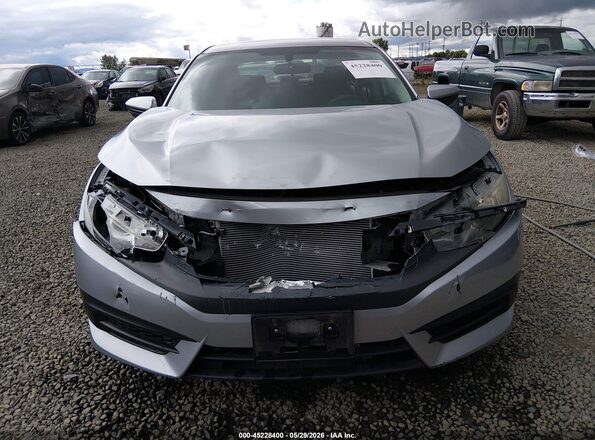 2HGFC2F57HH535562 2017 HONDA CIVIC Серебряный Вид задней части салона