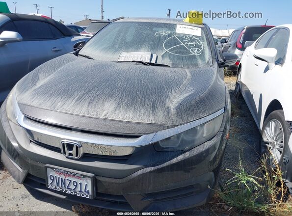 2HGFC2F58GH523354 2016 HONDA CIVIC Черный Вид задней части салона