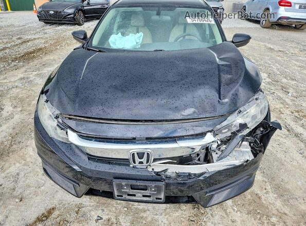 2HGFC2F58JH594058 2018 HONDA CIVIC Black 