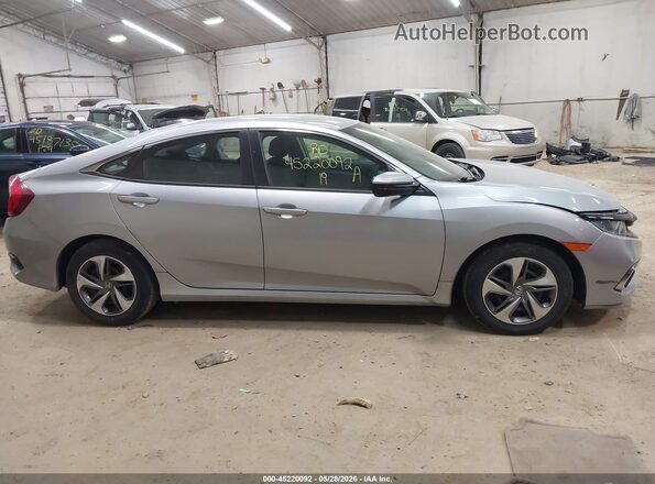 2HGFC2F60KH529036 2019 HONDA CIVIC Silver Rear interior view