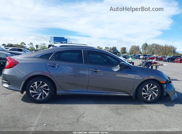 2HGFC2F74HH559478 2017 HONDA CIVIC Gray Rear interior view