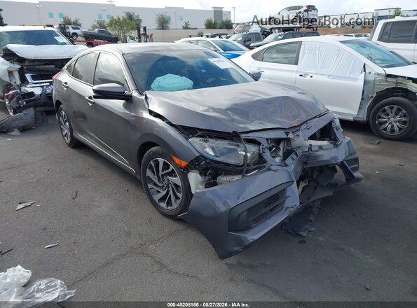2HGFC2F76JH519702 2018 HONDA CIVIC Gray უკანა სალონის ხედი