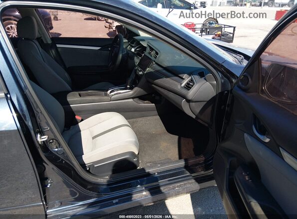 2HGFC2F76JH565501 2018 HONDA CIVIC Черный Вид салона спереди