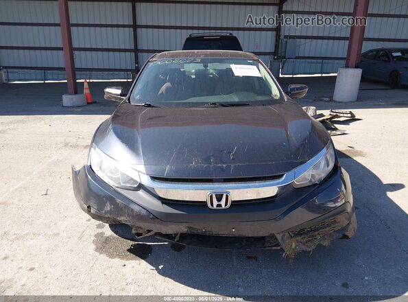 2HGFC2F76JH565501 2018 HONDA CIVIC Черный Вид задней части салона