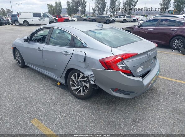 2HGFC2F79JH504921 2018 HONDA CIVIC Silver Rear left