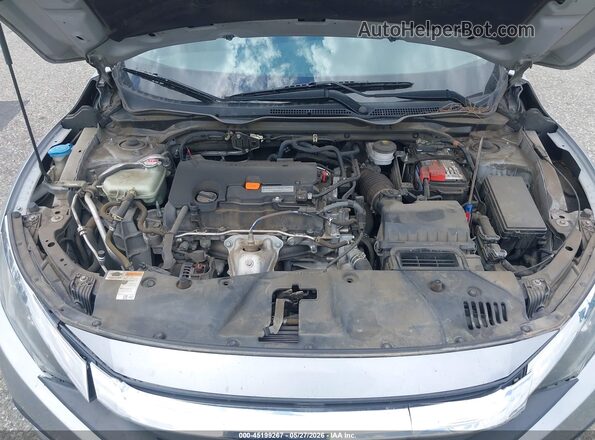2HGFC2F79JH504921 2018 HONDA CIVIC Silver Rear view