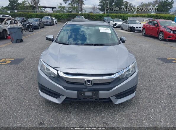 2HGFC2F79JH504921 2018 HONDA CIVIC Silver Instrument cluster view