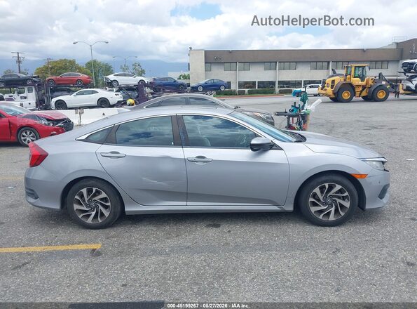 2HGFC2F79JH504921 2018 HONDA CIVIC Silver Rear interior view