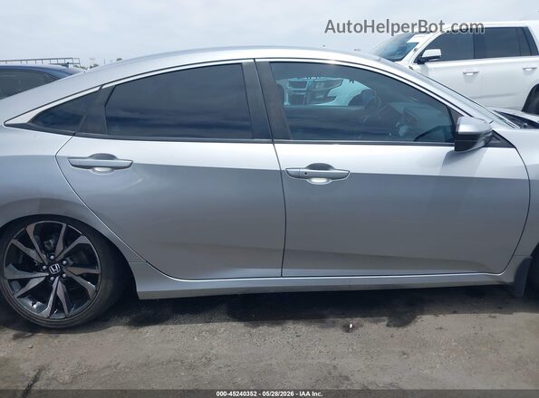 2HGFC2F89MH543019 2021 HONDA CIVIC Silver Rear interior view