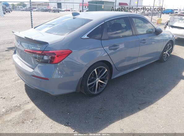 2HGFE1F91RH309364 2024 HONDA CIVIC Light Blue Tył prawy