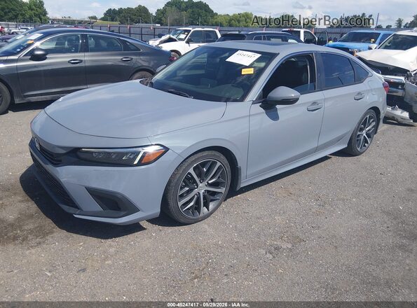2HGFE1F91RH309364 2024 HONDA CIVIC Light Blue Przód lewy