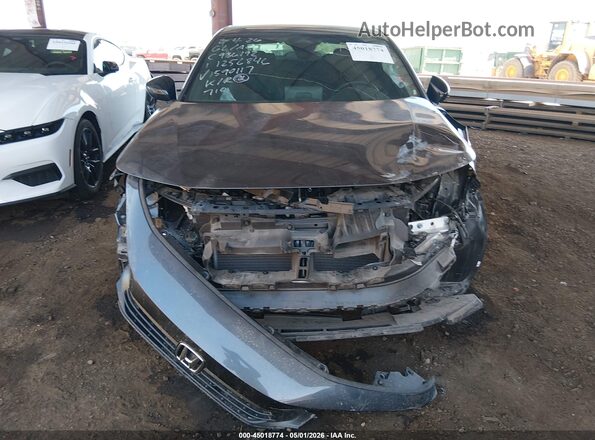 2HGFE2F53RH590117 2024 HONDA CIVIC Gray Vista interior trasera