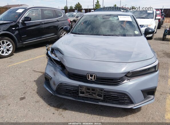 2HGFE2F57NH598263 2022 HONDA CIVIC Light Blue Սարքավորումների վահանակի տեսք