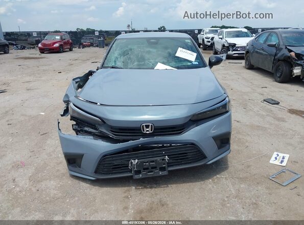 2HGFE2F59RH559759 2024 HONDA CIVIC Light Blue Առջևի վահանակի տեսք