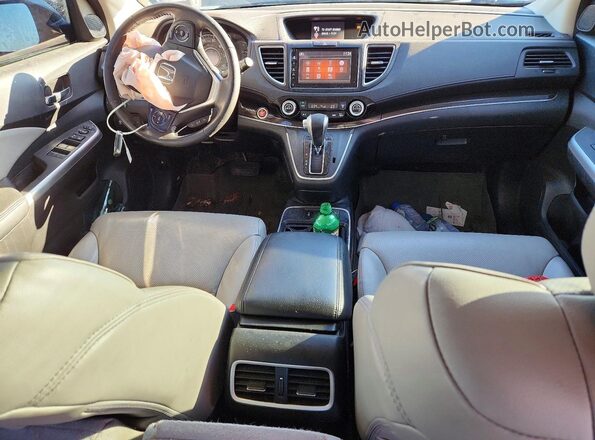 2HKRM4H76GH703975 2016 HONDA CR-V Серебряный Вид панели приборов
