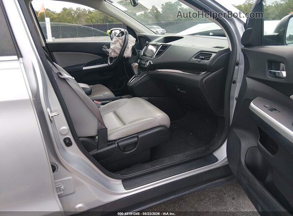 2HKRM4H77GH601357 2016 HONDA CR-V Silver Widok wnętrza z przodu