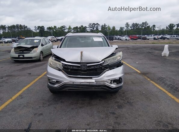 2HKRM4H77GH601357 2016 HONDA CR-V Silver Widok wnętrza z tyłu