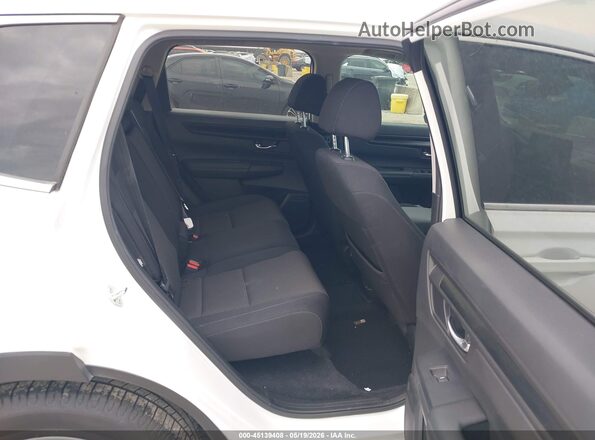 2HKRS3H45PH302584 2023 HONDA CR-V White Vista de la etiqueta del VIN