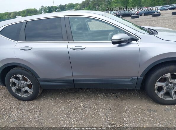 2HKRW2H59JH629004 2018 HONDA CR-V Gray Սալոնի հետևի տեսք