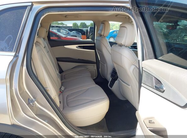 2LMPJ6J93LBL09363 2020 LINCOLN NAUTILUS Gold Widok naklejki z numerem VIN
