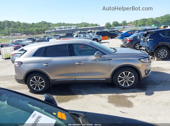 2LMPJ6J93LBL09363 2020 LINCOLN NAUTILUS Gold Widok wnętrza z tyłu
