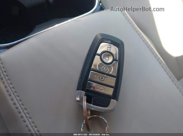 2LMPJ6J98MBL15824 2021 LINCOLN NAUTILUS Бежевый Вид панели приборов