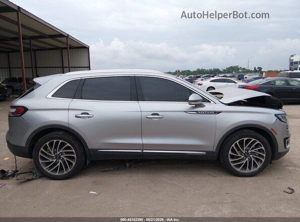 2LMPJ6K94LBL34626 2020 LINCOLN NAUTILUS Gray Vista interior trasera
