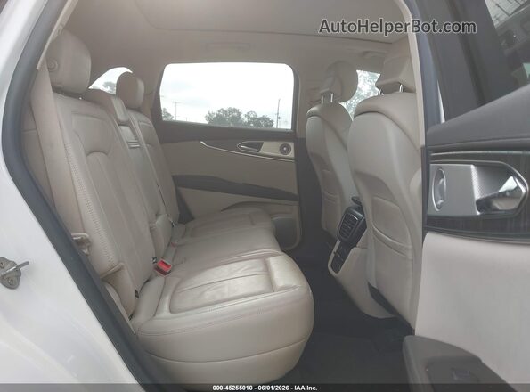 2LMPJ6LP4KBL47310 2019 LINCOLN NAUTILUS White Вид наклейки з VIN-кодом